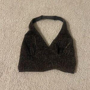 Sparkly black and gold crop top.